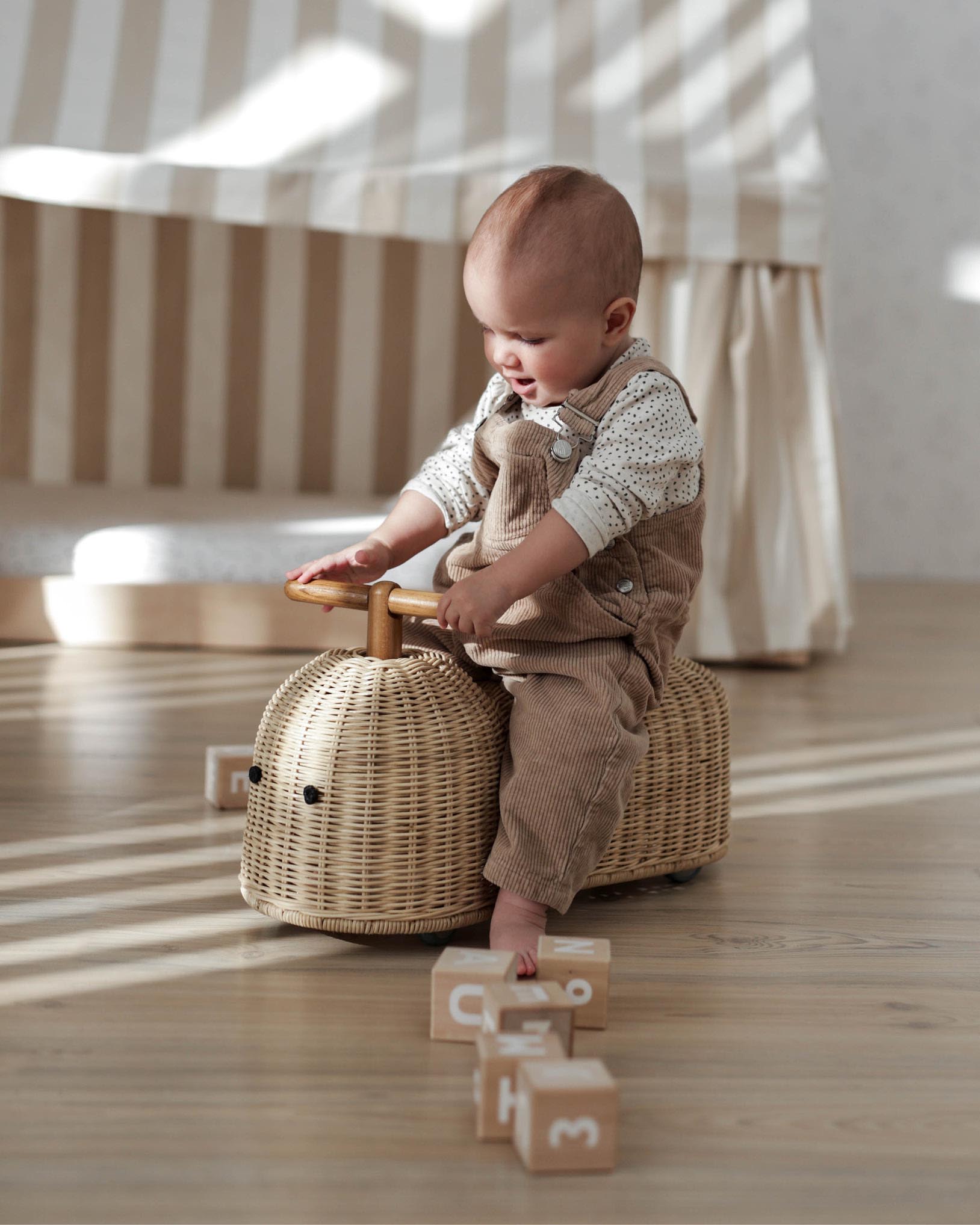 Child on ride on toy